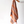 Striped scarf with orange and brown colors held by a person on a white background