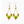 Pair of beaded earrings with green, tan and gold on a white background