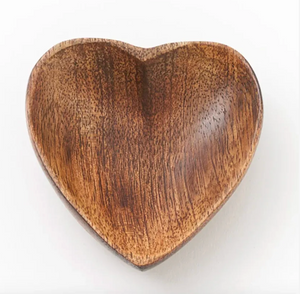 Wooden heart-shaped bowl on a white background