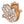 Wooden Hamsa hand with intricate carvings on a white background