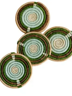 Set of four multicolor round woven coasters with green and brown patterns on a white background